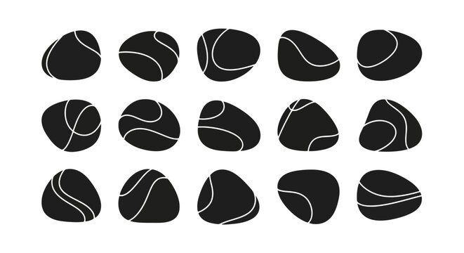 Set of smooth black river stones with white lines, natural rock collection.