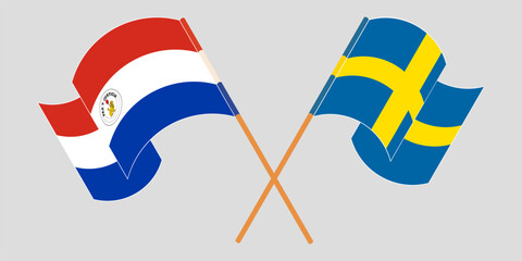 Crossed and waving flags of Republic of Paraguay and Sweden. Vector illustration