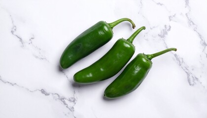 Fresh Jalape&ntilde;o Peppers on Marble Surface Showcasing Spicy Ingredient Detail, Culinary Preparation, and Vibrant Food Photography