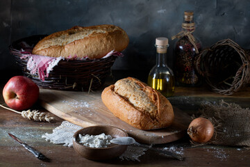 Fresh wheat bread on a wooden table