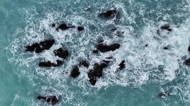 Low-altitude drone flight over whitecap waves