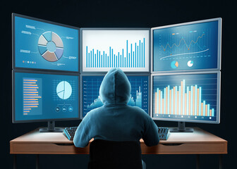 Hooded analyst working at a desk with multiple monitors showing charts, graphs, and financial data. Concept of data analysis, cybersecurity, trading, technology, and digital analytics.