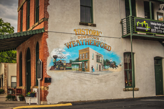 Historic Downtown Weatherford Mural Painting of Building and Old Town Scene on Side of Wall in Downtown Weatherford, Texas