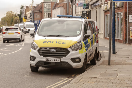 Police van parked on the street in London, Uk, busy london streets.
