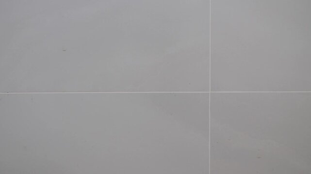 Light Gray Ceramic Tile Wall Texture with Clean Lines, Minimal Modern Interior Background
