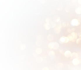 Golden bokeh sparkle glow light abstract background with fine glitter dust.
