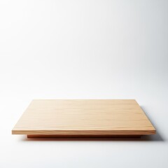 Fototapeta premium Minimalist empty wooden tabletop isolated against a clean white studio background, perfect for product display or copy space, grain, mockup, bright