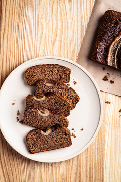 Slices of banana bread on plate viewed from above