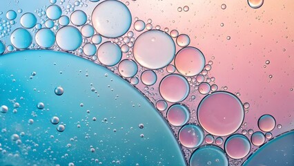 Soft pastel oil bubbles abstract texture in macro view. Delicate macro image of pastel-colored oil bubbles in water with a dreamy blue and pink gradient and organic cellular structure. See Less
