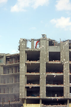 Demolition of the building with demolition excavator