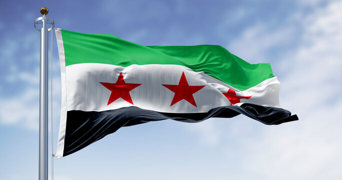 Close-up view of the Syria national flag waving in the wind