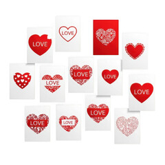 Assorted heart-shaped decorations and envelopes in red and white.