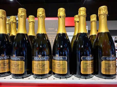 DARDILLY, FRANCE - November 3, 2025.Bottles of Casada Valdobbiadene Prosecco Superiore Extra Dry on supermarket shelf in France