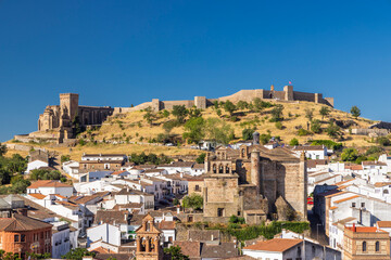 Aracena castle overlooking traditional Andalucian town houses in Spain
