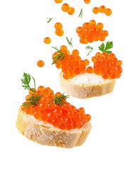 Red caviar salmon roe falling with parsley