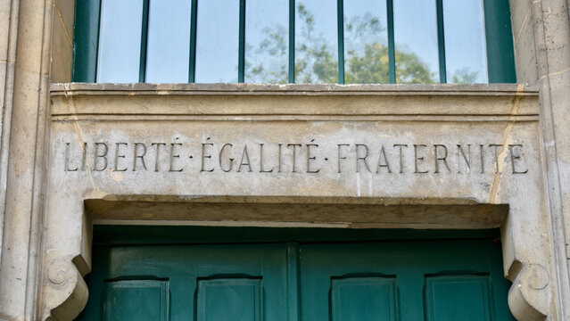 French National Motto - Libert&eacute;, &Eacute;galit&eacute;, Fraternit&eacute; (Liberty, Equality, Fraternity) - Inscribed in Stone above Doorway in Paris