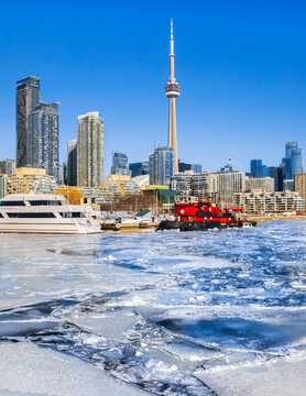 Toronto waterfront skyline in winter with frozen bay at Harbourfront 