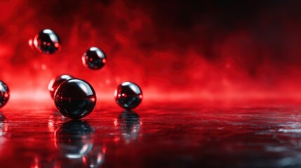 Fototapeta premium Glossy black spheres reflecting light against a vibrant red background, creating a striking abstract composition that evokes curiosity and energy.