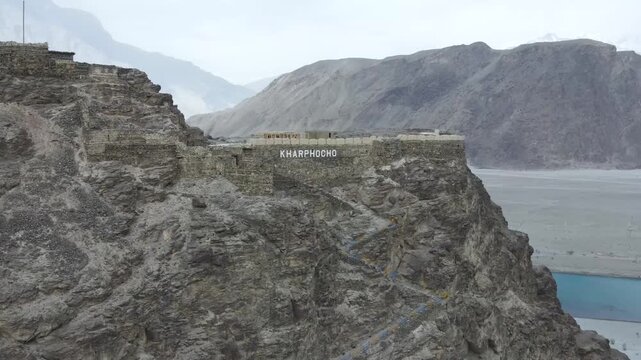 Drone orbiting around Kharphocho Fort, located on a mountain top in Skardu, Pakistan 4K aerial clip-Drone Video