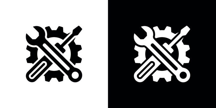 Black and white illustration of crossed wrenches and gears
