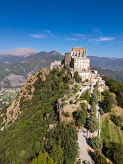 Obraz premium Aerial view of the Sacra di San Michele at dawn, Piedmont, Italy