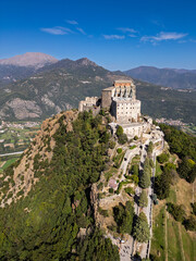 Obraz premium Aerial view of the Sacra di San Michele at dawn, Piedmont, Italy