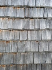 shingled roof, background of wooden shingles, tiles
