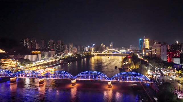 Lanzhou Night Cityscape with Illuminated Bridges Over Yellow River