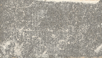 Abstract grainy textured surface showing weathered aged patterns