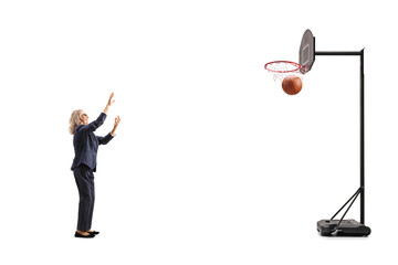 Mature businesswoman playing basketball © Ljupco Smokovski