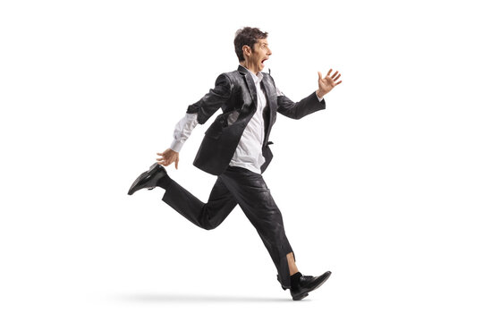 Scared man in a ripped suit runs in panic