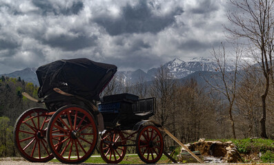 Fototapeta premium Parked wagon in mountain landscape, Greece