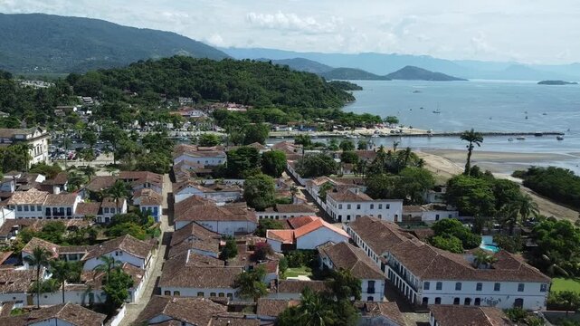 Aerial View of Paraty Historic Center with the river, the bay and Coastal Scenery with small islands, mountains and the Atlantic forest in Brazil