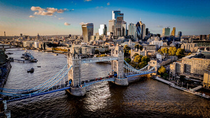 aerial view of London with Tower Bridge and The Shard at sunset, capturing dramatic light, strong contrast, and the city’s iconic skyline. © Francois Quartiers