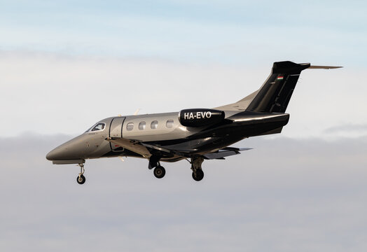 Barcelona, Spain - January 16, 2026: Phenom 100 business class aircraft bort number HA-EVO moving towards runway, landing at Josep Tarradellas Barcelona-El Prat Airport. Passenger and private aircraft