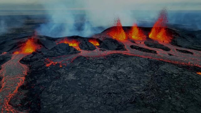 Aerial close up of multiple lava vents erupting at dsk