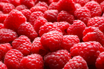 Fresh sweet ripe raspberries as background, closeup