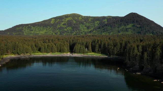 Priests performing an orthodox blessing of the waters ceremony on a remote alaskan shoreline