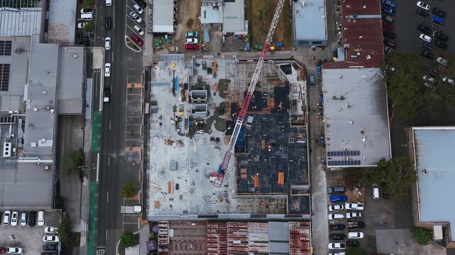 Oversight of construction in Melbourne Boronia, a crane is visible with construction and an unfinished building