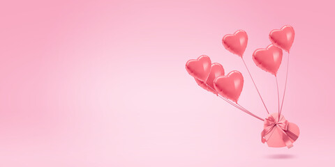 Gift box tied to heart-shaped balloons flying in air on color background, banner design. Card or...