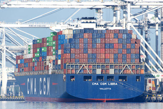 Oakland, CA - Feb 2, 2026: Cargo ship CMA CGM LIBRA loading at the port of Oakland, the fifth busiest port in the United States.