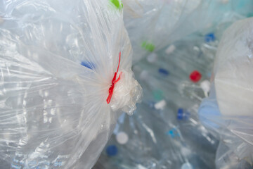 Plastic waste in a plastic bag for recycling and environment protection.