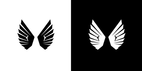 Obraz premium Graphic illustration of black and white wing icons on split contrasting backgrounds.