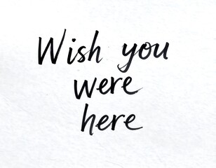Postcard with Wish You Were Here.