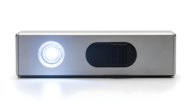 Front view of a modern portable mini projector with a sleek metallic body and glowing lens, isolated on a white background. Concept of home cinema and business presentation technology