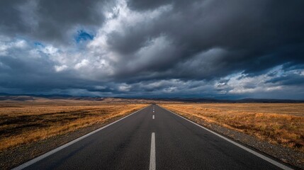 vanishing. An empty highway stretching under dramatic clouds, vanishing point adding depth to the moody landscape. travel magazines.