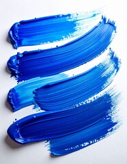 Vibrant Blue Paint Strokes on White Background.
