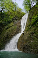 Fototapeta premium Waterfall in the mountains in the spring