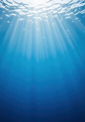 Obraz premium A vibrant blue saltwater environment showcasing beams of bright sunlight penetrating the deep layers of the vast, mysterious ocean, marine, background, immense