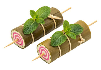 Two Bamboo Wrapped Pinwheel Appetizers with Mint food